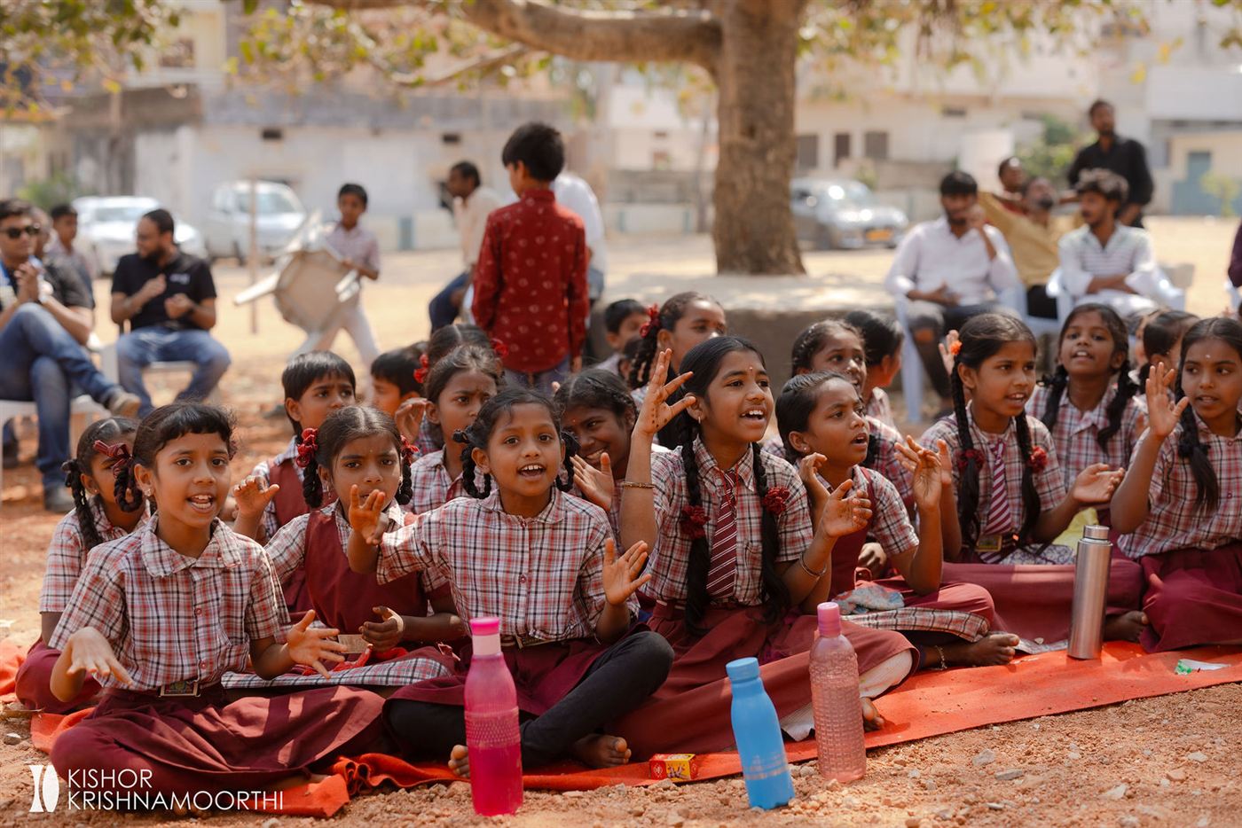Schoolchildren laughing at the Narsapur school inauguration